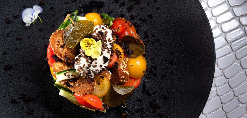 A twisted version of greek salad with yogurt, served at Phos Restaurant
